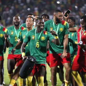 FILE PHOTO: Soccer Football - Africa Cup of Nations - Third Place Playoff Match - Burkina Faso v Cameroon - Ahmadou Ahidjo Stadium, Yaounde, Cameroon - February 5, 2022  Cameroon players celebrate after finishing in third place REUTERS/Mohamed Abd El Ghany